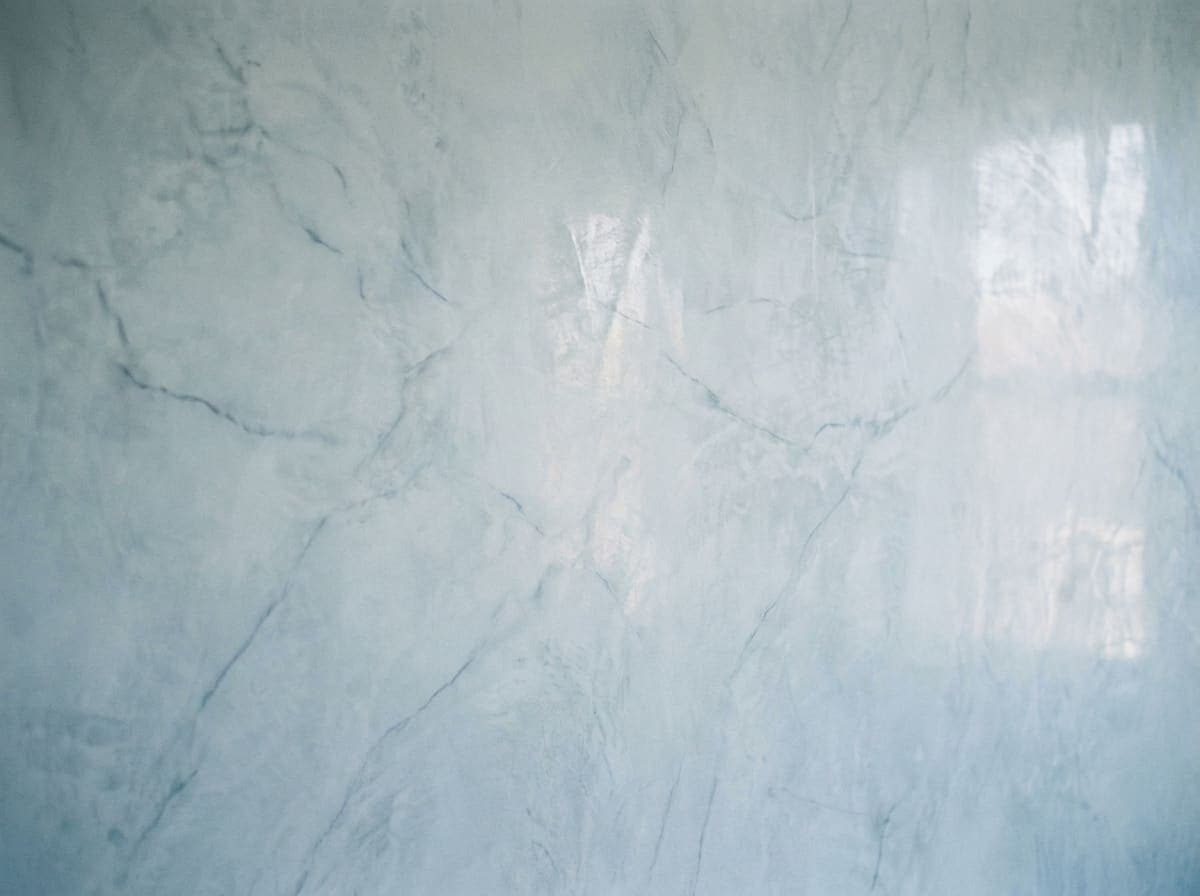 Polished Venetian plaster in pale blue-grey